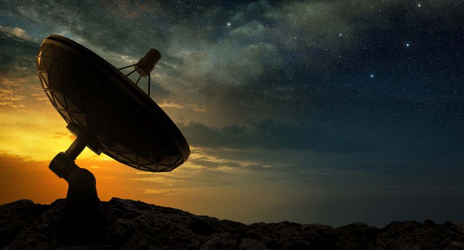 Satellite Dishes against a stary sky